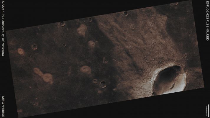 Possible Mud-Volcanoes in Acidalia Planitia (Absolute Natural Colors; credits for the additional process. and color.: Dr Paolo C. Fienga - Lunexit Team) 
Mars Local Time: 13:58 (Early Afternoon)
Coord. (centered): 43,7° North Lat. and 318,5° East Long.
Spacecraft altitude: 329,9 Km (such as about 206,2 miles) 
Original image scale range: 33,0 cm/pixel (with 1 x 1 binning) so objects ~ 99 cm across are resolved 
Map projected scale: 25 cm/pixel
Map projection: EQUIRECTANGULAR
Emission Angle: 25,3° 
Sun-Mars-Spacecraft (or "Phase") Angle: 89,5°
Solar Incidence Angle: 49° (meaning that the Sun is about 41° above the Local Horizon)
Solar Longitude: 6,8° (Northern Spring)
Credits: NASA/JPL/University of Arizona
Additional process. and coloring: Dr Paolo C. Fienga - Lunar Explorer Italia
Parole chiave: Mars from orbit - Acidalia Planitia