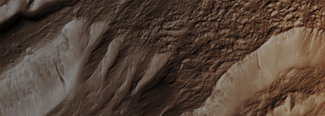 Valley Termini on Western Hecates Tholus (CTX "B" - Enhanced Natural Colors; credits for the additional process. and color.: Dr Paolo C. Fienga - Lunexit Team)
Mars Local Time: 14:21 (Early Afternoon)
Coord. (centered): 32,4° North Lat. and 149,1° East Long.
Spacecraft altitude: 302,8 Km (such as about 189,3 miles) 
Original image scale range: 60,6 cm/pixel (with 2 x 2 binning) so objects ~ 1 mt and 82 cm across are resolved 
Map projected scale: 50 cm/pixel
Map projection: EQUIRECTANGULAR
Emission Angle: 16,8° 
Sun-Mars-Spacecraft (or "Phase") Angle: 30,0°
Solar Incidence Angle: 44° (meaning that the Sun is about 46° above the Local Horizon)
Solar Longitude: 8,5° (Northern Spring)
Credits: NASA/JPL/University of Arizona
Additional process. and coloring: Dr Paolo C. Fienga - Lunar Explorer Italia
Parole chiave: Mars from orbit - Volcanoes - Hecates Tholus