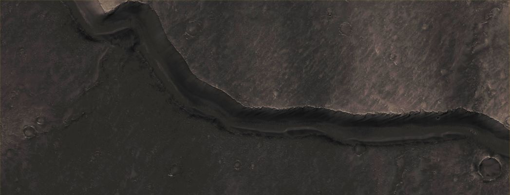 Arnus Vallis (CTX Frame n.2 - Enhanced Absolute Natural Colors; credits for the additoonal process. and color.: Dr Paolo C. Fienga - Lunexit Team)
Mars Local Time: 14:24 (early afternoon)
Coord. (centered): 13,2° North Lat. and 70,3° East Long.
Spacecraft altitude: 274,3 Km (such as about 171,4 miles) 
Original image scale range: 54,9 cm/pixel (with 2 x 2 binning) so objects ~ 1 mt and 65 cm across are resolved
Map projected scale: 50 cm/pixel
Map projection: EQUIRECTANGULAR
Emission Angle: 5,3° 
Phase Angle: 31,1°
Solar Incidence Angle: 36° (meaning that the Sun is about 54° above the Local Horizon)
Solar Longitude: 14,1° (Northern Spring)
Credits: NASA/JPL/University of Arizona
Additional process. and coloring: Lunar Explorer Italia
Parole chiave: Mars from orbit - Channels - Arnus Vallis