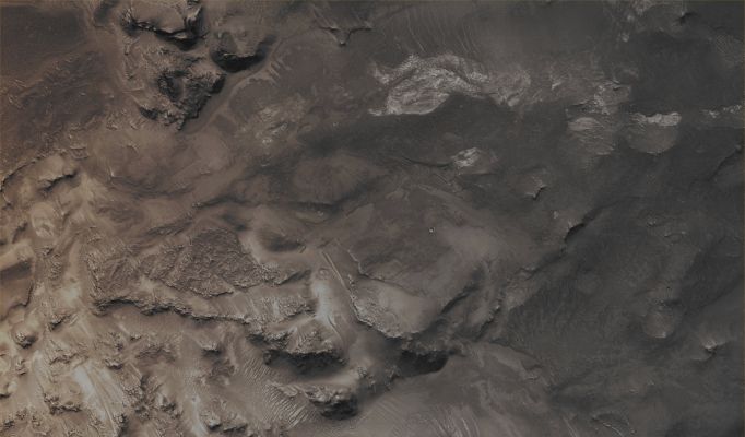 Features of Noctis Labyrinthus (CTX Frame "A" - Absolute Natural Colors; credits for the additional process. and color.: Dr Paolo C. Fienga - Lunexit Team)
Mars Local Time: 14:22 (early afternoon)
Coord. (centered): 6,0° South Lat. and 267,2° East Long.
Spacecraft altitude: 273,4 Km (such as about 170,9 miles) 
Original image scale range: 27,3 cm/pixel (with 1 x 1 binning) so objects ~ 82 cm across are resolved
Map projected scale: 25 cm/pixel
Map projection: EQUIRECTANGULAR
Emission Angle: 16,1° 
Phase Angle: 52,4°
Solar Incidence Angle: 37° (meaning that the Sun is about 53° above the Local Horizon)
Solar Longitude: 14,3° (Northern Spring)
Credits: NASA/JPL/University of Arizona
Additional process. and coloring: Lunar Explorer Italia
Parole chiave: Mars from orbit - Noctis Labyrinthus Region