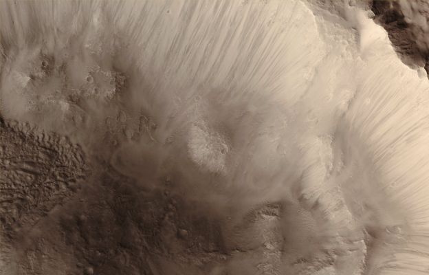 Unnamed Crater in Terra Cimmeria (CTX Frame "B" - Natural Colors; credits for the additional process. and color.: Dr Paolo C. Fienga - Lunexit Team)
Mars Local Time: 14:38 (early afternoon)
Coord. (centered): 32,7° South Lat. and 121,8° East Long.
Spacecraft altitude: 257,1 Km (such as about 160,7 miles) 
Original image scale range: 51,4 cm/pixel (with 2 x 2 binning) so objects ~ 1 mt and 54 cm across are resolved
Map projected scale: 50 cm/pixel
Map projection: EQUIRECTANGULAR
Emission Angle: 8,9° 
Phase Angle: 49,8°
Solar Incidence Angle: 55° (meaning that the Sun is about 35° above the Local Horizon)
Solar Longitude: 18,4° (Northern Spring)
Credits: NASA/JPL/University of Arizona
Additional process. and coloring: Lunar Explorer Italia
Parole chiave: Mars from orbit - Craters - Unnamed Crater with Gullies - Terra Cimmeria