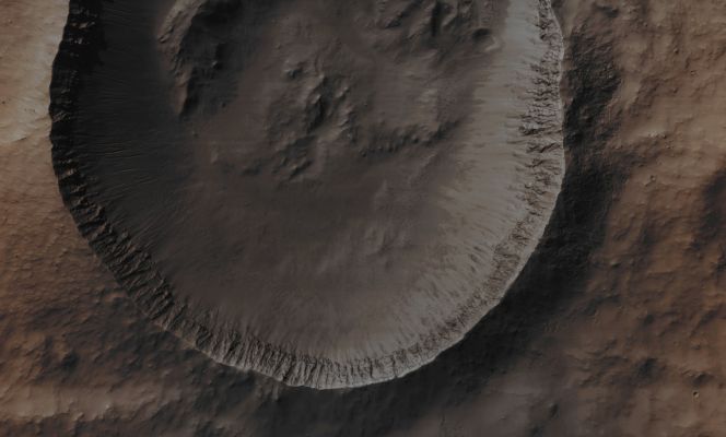 Unnamed Southern Crater (Enhanced Absolute Natural Colors; credits for the additional process. and color.: Dr Paolo C. Fienga - Lunexit Team)
Mars Local Time: 14:34 (early afternoon)
Coord. (centered): 32,0° South Lat. and 349,2° East Long.
Spacecraft altitude: 256,5 Km (such as about 160,3 miles) 
Original image scale range: 25,7 cm/pixel (with 1 x 1 binning) so objects ~ 77 cm across are resolved
Map projected scale: 25 cm/pixel
Map projection: EQUIRECTANGULAR
Emission Angle: 4,1° 
Phase Angle: 57,4°
Solar Incidence Angle: 54° (meaning that the Sun is about 36° above the Local Horizon)
Solar Longitude: 19,1° (Northern Spring)
Credits: NASA/JPL/University of Arizona
Additional process. and coloring: Lunar Explorer Italia
Parole chiave: Mars from orbit - Craters - Unnamed Southern Crater
