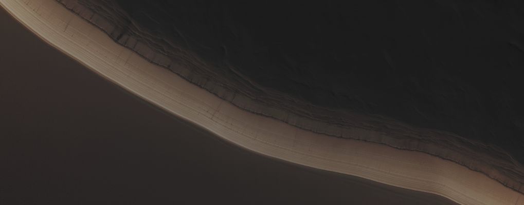 North Polar Scarp (Absolute Natural Colors; credits for the additional process. and color.: Dr Paolo C. Fienga - Lunexit Team)
Mars Local Time: 12:19 (early afternoon)
Coord. (centered): 85,0° North Lat. and 197,2° East Long.
Spacecraft altitude: 317,3 Km (such as about 198,3 miles) 
Original image scale range: 63,5 cm/pixel (with 2 x 2 binning) so objects ~ 1 mt and 90 cm across are resolved
Map projected scale: 50 cm/pixel
Map projection: POLAR STEREOGRAPHIC
Emission Angle: 0,1° 
Phase Angle: 77,0°
Solar Incidence Angle: 77° (meaning that the Sun is about 13° above the Local Horizon)
Solar Longitude: 19,2° (Northern Spring)
Credits: NASA/JPL/University of Arizona
Additional process. and coloring: Lunar Explorer Italia
Parole chiave: Mars from orbit - North Polar Regions - The Scarp
