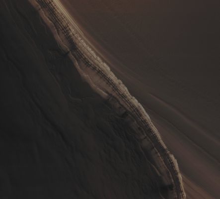 North Polar Scarp (Absolute Natural Colors; credits for the additional process. and color.: Dr Paolo C. Fienga - Lunexit Team)
Mars Local Time: 12:49 (early afternoon)
Coord. (centered): 83,9° North Lat. and 122,8° East Long.
Spacecraft altitude: 320,5 Km (such as about 200,3 miles) 
Original image scale range: 64,1 cm/pixel (with 2 x 2 binning) so objects ~ 1 mt and 92 cm across are resolved
Map projected scale: 50 cm/pixel
Map projection: POLAR STEREOGRAPHIC
Emission Angle: 0,2° 
Phase Angle: 75,9°
Solar Incidence Angle: 76° (meaning that the Sun is about 14° above the Local Horizon)
Solar Longitude: 19,3° (Northern Spring)
Credits: NASA/JPL/University of Arizona
Additional process. and coloring: Lunar Explorer Italia
Parole chiave: Mars from orbit - North Polar Regions - The Scarp