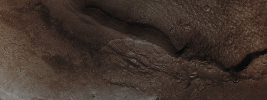 Periglacial Surface Feature in Arabia Terra (Absolute Natural Colors; credits for the additional process. and color.: Dr Paolo C. Fienga - Lunexit Team)
Mars Local Time: 14:13 (early afternoon)
Coord. (centered): 38,2° North Lat. and 353,5° East Long.
Spacecraft altitude: 315,9 Km (such as about 197,4 miles) 
Original image scale range: 63,2 cm/pixel (with 2 x 2 binning) so objects ~1 mt and 90 cm across are resolved 
Map projected scale: 50 cm/pixel
Map projection: EQUIRECTANGULAR 
Emission Angle: 20,0° 
Phase Angle: 60,7°
Solar Incidence Angle: 42° (meaning that the Sun is about 48° above the Local Horizon)
Solar Longitude: 20,5° (Northern Spring)
Credits: NASA/JPL/University of Arizona
Additional process. and coloring: Lunar Explorer Italia
Parole chiave: Mars from orbit - Arabia Terra Region