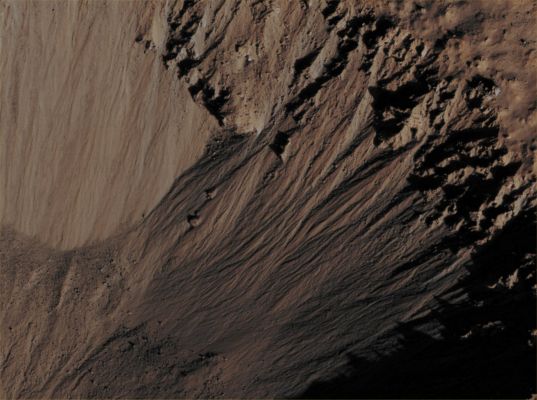 Unnamed Southern Crater with deep incised and colourful Gullies (EDM n.2 - Absolute Natural Colors; credits for the additional process. and color.: Dr Paolo C. Fienga - Lunexit Team)
Mars Local Time: 14:48 (early afternoon)
Coord. (centered): 35,0° South Lat. and 300,9° East Long.
Spacecraft altitude: 251,6 Km (such as about 157,2 miles) 
Original image scale range: 25,2 cm/pixel (with 1 x 1 binning) so objects ~ 76,0 cm across are resolved
Map projected scale: 25 cm/pixel
Map projection: EQUIRECTANGULAR
Emission Angle: 4,0° 
Sun - Mars - MRO (or "Phase") Angle: 60,2°
Solar Incidence Angle: 63° (meaning that the Sun is about 27° above the Local Horizon)
Solar Longitude: 32,5° (Northern Spring)
Credits: NASA/JPL/University of Arizona
Additional process. and coloring: Lunar Explorer Italia
Parole chiave: Mars from orbit - Craters - Unnamed Southern Crater with colorful Gullies