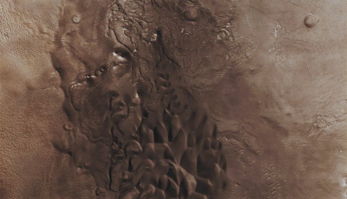 Large Dunefield in Noachis Terra (CTX Frame - Absolute Natural Colors; credits for the additional process. and color.: Dr Paolo C. Fienga - Lunexit Team)
Mars Local Time: 14:52 (early afternoon)
Coord. (centered): 42,4° South Lat. and 42,0° East Long.
Spacecraft altitude: 252,2 Km (such as about 157,6 miles) 
Original image scale range: 25,2 cm/pixel (with 1 x 1 binning) so objects ~ 76,0 cm across are resolved
Map projected scale: 25 cm/pixel
Map projection: EQUIRECTANGULAR
Emission Angle: 0,4° 
Sun - Mars - MRO (or "Phase") Angle: 69,9°
Solar Incidence Angle: 69° (meaning that the Sun is about 21° above the Local Horizon)
Solar Longitude: 36,5° (Northern Spring)
Credits: NASA/JPL/University of Arizona
Additional process. and coloring: Lunar Explorer Italia
Parole chiave: Mars from orbit - Dunefield - Noachis Terra Region