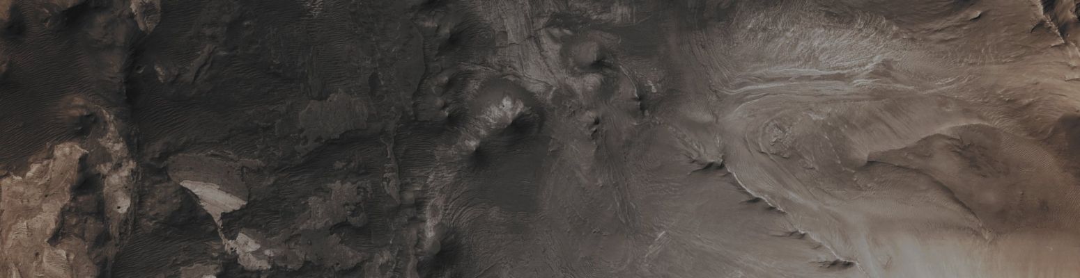 Features of Jus Chasma (Absolute Natural Colors; credits for the additional process. and color.: Dr Paolo C. Fienga/Lunar Explorer Italia/Italian Planetary Foundation)
This image, taken by the NASA - Mars Reconnaissance Orbiter in December 2011, shows us a portion of Jus Chasma, a segment of the massive Martian Canyon System known as Vallis Marineris; the most important detail visible in the picture is given by the presence, within the Chasma, of a Fault (which, by the way, it had been previously imaged by the NASA - Mars Global Surveyor (MGS) - Mars Orbiter Camera (MOC). 
If you look carefully towards the centre/right (Dx) side of the picture, you will also notice that a small Valley cuts across the Ridge. Planetary Scientists have asked themselves if what we see here could be the final result of the action of some Tectonic Process, and a Study that was carried out about this topic in the AD 2012, suggested that Mars actually possesses Tectonic Plates! However, and even admitting that what has been suggested by the aformentioned Study is actually true, the question about how these processes worked (or are still working, even though in just a "residual way"...) here and, perhaps, elsewhere on the Red Planet, is still unanswered.

Mars Local Time: 14:56 (Early Afternoon)
Coord. (centered): 7,899° South Lat. and 279,399° East Long.
Spacecraft altitude: 287,5 Km (such as about 178,53 miles) 
Original image scale range: 28,8 cm/pixel (with 1 x 1 binning) so objects ~ 86 cm across are resolved
Map projected scale: 25 cm/pixel
Map projection: EQUIRECTANGULAR
Emission Angle: 24,3° 
Phase Angle: 33,4°
Solar Incidence Angle: 50° (meaning that the Sun was about 40° above the Local Horizon at the time the picture was taken)
Solar Longitude: 43,2° (Northern Spring - Southern Fall)
Credits: NASA/JPL/University of Arizona
Additional process. and coloring: Lunar Explorer Italia

This picture (which is a NASA - Original Mars Reconnaissance Orbiter NON_Map Projected CTX b/w frame identified by the serial n. ESP_025231_1720 and a NASA - Original Mars Reconnaissance Orbiter EDM false-color frame identified by the serial n. ESP_025164_1655-1) have been additionally processed and then colorized (and re-colorized, respectively) in Absolute Natural Colors (such as the colors that a human eye would actually perceive if someone were onboard the NASA - Mars Reconnaissance Orbiter and then looked down, towards the Surface of Mars), by using an original technique created - and, in time, dramatically improved - by the Lunar Explorer Italia Team.
Parole chiave: Mars from orbit - Chasmas - Jus Chasma