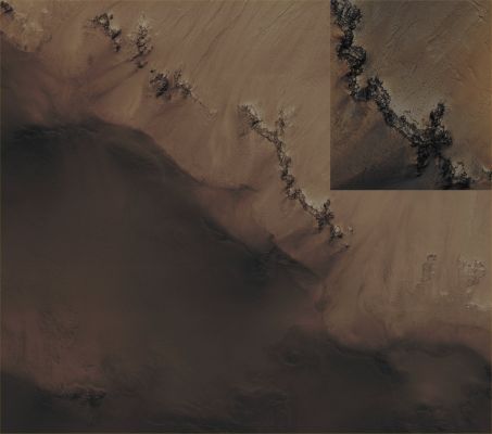 Exposed Bedrock on the Wall of an Unnamed Northern Crater (CTX Frame and EDM - Absolute Natural Colors; credits for the additional process. and color.: Dr Paolo C. Fienga - Lunar Explorer Italia)
Mars Local Time: 14:46 (early afternoon)
Coord. (centered): 52,6° North Lat. and 15,5° East Long.
Spacecraft altitude: 309,4 Km (such as about 193,4 miles) 
Original image scale range: 61,9 cm/pixel (with 2 x 2 binning) so objects ~ 1 mt and 86 cm across are resolved
Map projected scale: 50 cm/pixel
Map projection: EQUIRECTANGULAR
Emission Angle: 7,9° 
Sun - Mars - MRO (or "Phase") Angle: 38,4°
Solar Incidence Angle: 45° (meaning that the Sun is about 45° above the Local Horizon)
Solar Longitude: 54,9° (Northern Spring)
Credits: NASA/JPL/University of Arizona
Additional process. and coloring: Lunar Explorer Italia
Parole chiave: Mars from orbit - Craters - Unnamed Northern Crater with exposed Bedrock