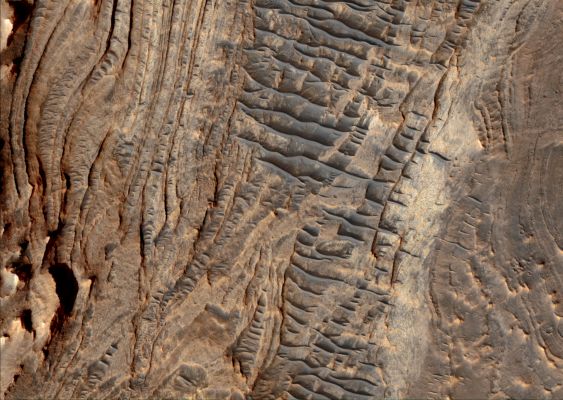 Features of West Candor Chasma (EDM - Absolute Natural Colors; credits for the additional process. and color.: Dr Paolo C. Fienga - Lunexit Team)
Mars Local Time: 15:13 (early afternoon)
Coord. (centered): 6,733° South Lat. and 284,485° East Long.
Spacecraft altitude: 266,6 Km (such as about 166,6 miles) 
Original image scale range: 26,7 cm/pixel (with 1 x 1 binning) so objects ~ 80 cm across are resolved (with 4 x 4 binning)
Map projected scale: 25 cm/pixel
Map projection: EQUIRECTANGULAR
Emission Angle: 9,8° 
Sun - Mars - MRO (or "Phase") Angle: 50,0°
Solar Incidence Angle: 57° (meaning that the Sun is about 33° above the Local Horizon)
Solar Longitude: 82,4° (Northern Spring)
Credits: NASA/JPL/University of Arizona
Additional process. and coloring: Lunar Explorer Italia
Parole chiave: Mars from orbit - Chasmas - Candor Chasma