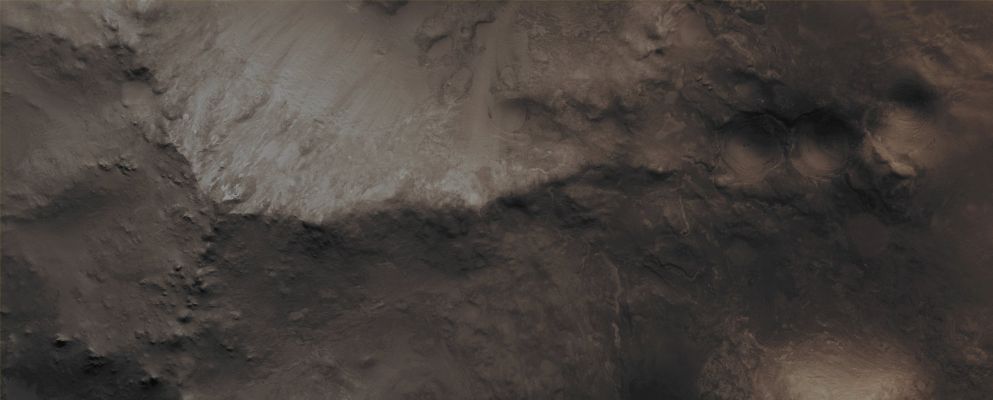 Features of Nilosyrtis Mensae (CTX Frame "B" - Absolute Natural Colors; credits for the additional process. and color.: Dr Paolo C. Fienga - Lunar Explorer Italia/Italian Planetary Foundation)
Mars Local Time: 15:34 (Middle Afternoon)
Coord. (centered): 28,286° North Lat. and 75,424° East Long.
Spacecraft altitude: 287,8 Km (such as about 179,9 miles) 
Original image scale range: 28,8 cm/pixel (with 1 x 1 binning) so objects ~ 86 cm across are resolved
Map projected scale: 25 cm/pixel
Map projection: EQUIRECTANGULAR
Emission Angle: 8,5° 
Sun-Mars-MRO (or "Phase") Angle: 50,4°
Solar Incidence Angle: 59° (meaning that the Sun was about 31° above the Local Horizon of the imaged Region, at the time that the picture was taken)
Solar Longitude: 180,1° (Northern Autumn - Southern Spring)
Credits: NASA/JPL/University of Arizona
Additional process. and coloring: Lunar Explorer Italia
Parole chiave: Mars from orbit - Nilosyrtis Mensae
