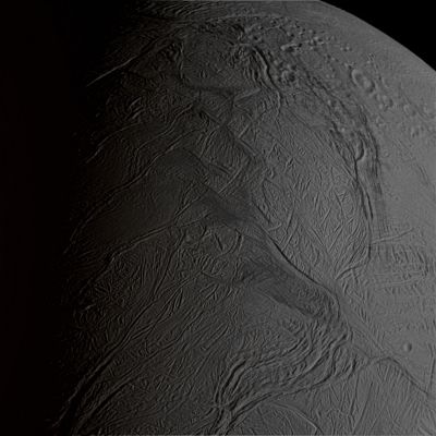 Enceladus (natural colors; credits: Lunexit)
Caption NASA:"What telling impurities taint the ice plumes of Enceladus? To help answer this question, the robotic Cassini spacecraft dove last week to within 30 kilometers of Saturn's ice-plume emitting moon. At this closest-ever approach, Cassini attempted to sniff and obtain chemical data on particles ejected from Enceladus' regular surface, while at other times Cassini flew right through -- and sampled -- ice geysers directly. Searches in the data for impurity clues in the water-ice dominated plumes and surface ejecta are progressing. Although the main purpose of this flyby was particle analysis, several interesting images are emerging. Visible in the above image, for example, is an unusual gray sheen running vertically up the image center that might be water vapor escaping from surface canyons. Other notable features visible above include vast plains of craterless icy grooves, the day-night terminator across the image left, and an area near the top comparatively rich in craters. Cassini is scheduled to buzz by Enceladus in an imaging run near the end of this month".
Parole chiave: Saturn's Moon - Enceladus