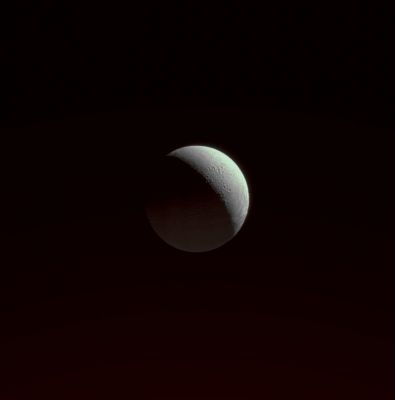 Double "Space-Lights" on Enceladus! (natural colors; credits: Lunexit)
Caption NASA:"As the Cassini Spacecraft began its August 2008 flyby of Enceladus, the spacecraft approached over the moon's cratered North Pole. Cassini acquired this view as the icy moon grew ever larger in its field of view. 
In addition to the sunlit crescent at upper right, the faint glow at bottom indicates a secondary source of illumination: reflected sunlight from Saturn (a.k.a.: "Saturnshine"). 
The view looks toward high Northern Latitudes on Enceladus from a perspective of 71° North of the moon's Equator. 
The North Pole is in shadow at center. 

The image was taken in visible light with the Cassini Spacecraft narrow-angle camera on Aug. 11, 2008. The view was obtained at a distance of approx. 448.000 Km (such as about 278.000 miles) from Enceladus and at a Phase Angle of 113°. 
Image scale at maximum resolution is approx. 3 Km (a little less than 2 miles) per pixel".
Parole chiave: Saturn's Moon - Enceladus