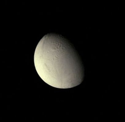 Just like a Pearl... (Natural Colors; credits: Lunexit)
Caption NASA:"The Cassini Spacecraft looks down at craters near the North Pole of Enceladus. 
Cratered surfaces on Solar System moons indicate older terrains, while smooth surfaces are generally younger and therefore indicative of processes which eliminated the craters. 
See also PIA08353 to learn more about the true nature of these surfaces and the processes at work on this geologically active moon. 
The moon's North Pole lies on the Terminator to the right of the craters seen in this image. Lit Terrain seen here is on the anti-Saturn side and Trailing Hemisphere of Enceladus. 

The image was taken in Visible Light with the Cassini Spacecraft narrow-angle camera on July 11, 2009. The view was obtained at a distance of approx. 472.000 Km (such as about 293.000 miles) from Enceladus and at a Sun-Enceladus-Spacecraft (or Phase) Angle of 57°. 
Image scale is roughly 3 Km (a little less than 2 miles) per pixel".
Parole chiave: Saturn's Moon - Enceladus