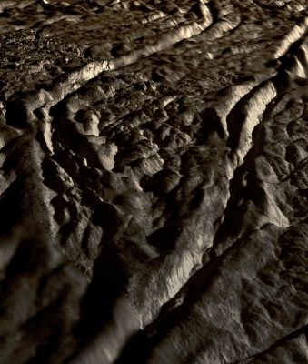 Perspective view of Baghdad Sulcus, Enceladus (Natural Colors; credits: Lunexit)
This perspective view of Baghdad Sulcus was generated using high resolution images of Enceladus acquired in August 2008 at 12 to 30 meters (40 to 100 feet) resolution, together with a new topographic map of the region produced by Dr. Paul Schenk (http://www.lpi.usra.edu/lpi/schenk/) at the Lunar and Planetary Institute in Houston, TX. Lower resolution images to either side were acquired at 50 to 80 meter (165 to 260 feet) resolution. 

Baghdad Sulcus is one of several prominent linear structures, dubbed “Tiger Stripes”, within the geologically active South Polar Region of Enceladus. This view shows a wedge-shaped area between two prominent branches of Baghdad Sulcus. Each branch consists of two large parallel ridges up to 2 Km (approx. 1,2 mile) across separated by a deep V-shaped medial trough. 
The ridges are 80 to 100 meters (approximately 260 to 325 feet) high. The medial troughs between the ridges are 200 to 250 meters (650 to 820 feet) deep. The maximum separation between the two branches is about 12 Km (about 7.5 miles). 
Troughs such as those shown here are probably the source of numerous jets making up the large active water vapor plume over the South Pole of Enceladus. The floors of the medial troughs are often broken up into smaller ridges. These could be blocks of crust that have slid down the walls of the trough or fractured blocks pushed up from below. Relief has been exaggerated by a factor of ~10 to enhance clarity. 

The raw data from which this product was developed were retrieved from the Planetary Data System's Cassini archives. The Cassini-Huygens mission is a cooperative project of NASA, the European Space Agency and the Italian Space Agency. The Jet Propulsion Laboratory, a division of the California Institute of Technology in Pasadena, manages the mission for NASA's Science Mission Directorate, Washington, D.C. The Cassini orbiter and its two onboard cameras were designed, developed and assembled at JPL. The imaging operations center is based at the Space Science Institute in Boulder, Colo. (http://ciclops.org)
Parole chiave: Saturn's Moon - Enceladus