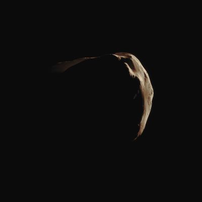 Like a "Cosmic Apple"... (Natural Colors; credits for the additional process. and color.: Dr Paolo C. Fienga - Lunar Explorer Italia)
Caption NASA:"Saturn's small, irregularly shaped moon Helene is strikingly illuminated in this close view captured by Cassini during the Spacecraft's June 18, 2011, Fly-By. Although it is not visible at this exposure, the Planet (Saturn?) actually fills the dark background of this image of Helene.
This view looks toward the anti-Saturn side of Helene (which is about 33 Km, or approx. 21 miles across). North on Helene is up. The lit Terrain on the right is on the Leading Hemisphere, while lit Terrain at the top of the image surrounds the North Pole.
This image was taken in Visible Light with the Cassini Spacecraft narrow-angle camera. The view was obtained at a distance of approximately 11,000 kilometers (7,000 miles) from Helene and at a Sun-Helene-Spacecraft, or Phase, Angle of 151°. 
Image scale is roughly 67 meters (220 feet) per pixel".
Parole chiave: Saturnian Moons - Helene