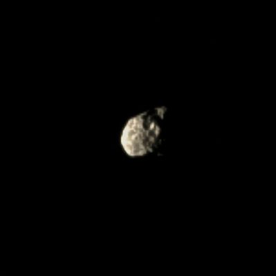 Tumbling Hyperion (Natural Colors; credits: Lunexit)
Caption NASA:"The Cassini Spacecraft peers at the pitted Surface of the small and irregularly-shaped moon Hyperion. 
See PIA09728 to learn how these pits are created on low-density Hyperion (about 270 Km, or approx. 168 miles across). To watch a movie of this "tumbling moon", see PIA07683. 
Scale in the original image was 9 Km (approx. 5,5 miles) per pixel. The image has been magnified by a factor of three and contrast-enhanced to aid visibility. 

The image was taken in Visible Light with the Cassini Spacecraft narrow-angle camera on Sept. 5, 2009. The view was obtained at a distance of approx. 1,4 MKM (such as about 870.000 miles) from Hyperion and at a Phase Angle of 91°".
Parole chiave: Saturn's Moon - Hyperion