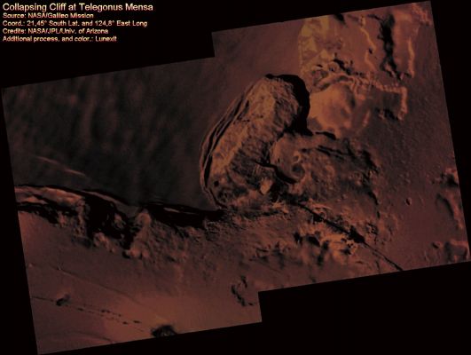 Collapsing Cliff at Telegonus Mensa (MULTISPECTRUM; credits: Lunexit)
Caption NASA:"This mosaic, showing an area called Telegonus Mensa, on Jupiter's moon Io and obtained by using frames taken by the NASA's Galileo Spacecraft on Oct. 16, 2001, reveal a complex interplay of geologic processes. 
Four small, HR frames (9,6 mt, or 32 feet, per picture element) have been set into the larger context mosaic, which has a resolution of 42 mt (140 feet) per picture element. The illumination is from the upper right and North is to the top of the mosaic. A fracture runs North-West from the lower right corner of the mosaic into the amphitheater in the center of the frame. A HR image along this fracture reveals that lava has erupted from it. 

The amphitheater itself is the site of extensive erosion, as the cliff has slumped South-Eastward under the influence of Io's gravity. HR frames directly south of the amphitheater show another slumping cliff in detail. Flat tops of massive slump blocks — up to 6 Km (3,7 miles) long and 0,5 Km (0,3 miles) across — are illuminated by the the Sun and cast shadows down the face of the cliff. 
Based on these shadows, Galileo scientists estimate that the cliff is 1 to 2 Km high. 

Just to the left of center a series of landslides can be seen, the longest of which extends for about 4 Km (such as approx. 2,5 miles)".
Parole chiave: Jupiter Moons - Io