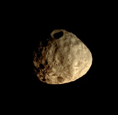 Janus (Natural Colors; credits: Lunexit)
Caption NASA:"The Cassini Spacecraft eyes a prominent crater on the moon Janus. 
The South Pole lies on the Terminator at the bottom left of the image. This view is centered on terrain at 16° South Lat., 64° West Long.; this view looks toward the Leading Hemisphere of Janus (about 179 Km, or approx. 111 miles across). North on Janus is up and rotated 31° to the right. 

The image was taken in Visible Light with the Cassini Spacecraft narrow-angle camera on July 26, 2009. The view was acquired at a distance of approx. 98.000 Km (such as about 61.000 miles) from Janus and at a Sun-Janus-Spacecraft, or Phase, Angle of 58°. 
Image scale is roughly 586 meters (1922 feet) per pixel".
Parole chiave: Saturn's Moon - Janus