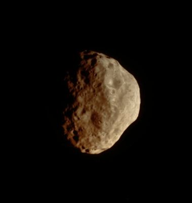 Janus (Natural - but enhanced - Colors; credits: Lunexit)
Caption NASA:"The Cassini Spacecraft looks toward the South Pole and cratered surface of Saturn's moon Janus. 
The Pole of Janus lies on the Terminator, about one-third of the way inward from the bottom of the image. This view is centered on terrain at 42° South Lat. and 32° West Long.; the lit Terrain seen here is on the Saturn-facing side of Janus. 

The image was taken in visible light with the Cassini Spacecraft narrow-angle camera on July 26, 2009. The view was acquired from a distance of approx. 100.000 Km (i.e. about 62.000 miles) from Janus and at a Sun-Janus-Spacecraft, or Phase, Angle of 63°. 
Image scale is roughly 600 meters (1968 feet) per pixel".
Parole chiave: Saturn's Moon - Janus