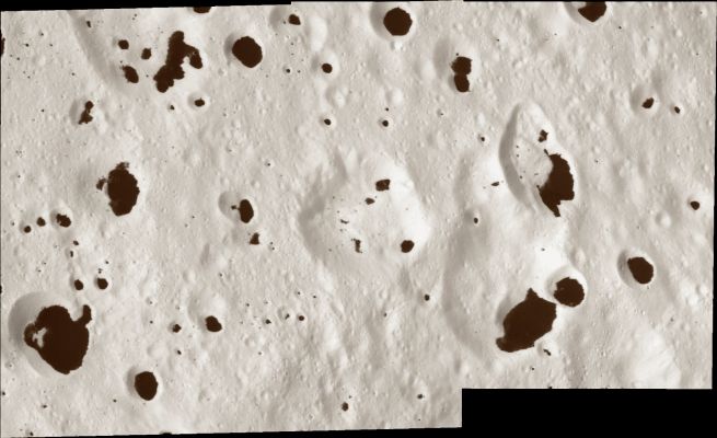 Japetus' Spots (HR - possible natural colors; elab. Lunexit)
At high resolution, terrain in the Transition Region between bright and dark Hemispheres on Saturn's moon Japetus reveals a spotty appearance reminiscent of a Dalmatian. The bright material on the frozen surface of Iapetus is water ice, and the dark material is likely carbonaceous in composition. 
The dark material is preferentially found at the bottoms of craters. Bright water ice forms the "bed rock" on Japetus, while the dark, presumably loose material apparently lies on top of the ice (the terrain seen here is also visible in PIA08383, but it is viewed here at higher resolution). 
The mosaic consists of 2 image footprints across the surface of Japetus. The view is centered on terrain near 42° South Latitude and 209,3° West Longitude, on the anti-Saturn facing Hemisphere. Image scale is approx. 32 meters (105 feet) per pixel. 
The clear spectral filter images in this mosaic were obtained with the Cassini spacecraft narrow-angle camera on Sept. 10, 2007, at distances ranging from 5.363 to 5.884 Km from Japetus.
Parole chiave: Saturn's Moons - Japetus