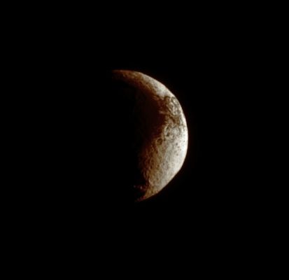 Crescent Japetus (possible Natural Colors; credits: Dr Paolo C. Fienga - Lunexit Team)
Caption NASA:"The Cassini Spacecraft examines the rough Dark-Light Dichotomy of the Terrain on Saturn's moon Japetus. Scientists continue to investigate the nature of this moon's Surface. 
Lit Terrain seen here is on the Saturn-facing side of Japetus. 

North on Japetus is up and rotated 8° to the left. Scale on Japetus was about 7 Km (about 4,3 miles) per pixel in the original image. The image was contrast enhanced and magnified by a factor of two to enhance the visibility of Surface Features. 

The image was taken in Visible Green Light with the Cassini Spacecraft narrow-angle camera on Sept. 13, 2009. The view was acquired at a distance of approx. 1,2 MKM (about 746.000 miles) from Iapetus and at a Sun-Japetus-Spacecraft, or Phase, Angle of 103°".
Parole chiave: Saturn's Moon - Japetus