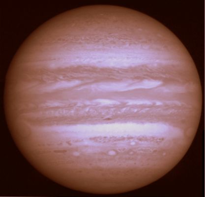 Jupiter, from New Horizons
Caption NASA:"This image of Jupiter is produced from a 2x2 mosaic of photos taken by the New Horizons Long Range Reconnaissance Imager (LORRI), and assembled by the LORRI Team at the Johns Hopkins University Applied Physics Laboratory. 
The telescopic camera snapped the images during a 3', 35" span on February 10, 2007, when the spacecraft was about 29 MKM (approx. 18 MMs) from Jupiter. 
At this distance, Jupiter's diameter was 1015 LORRI pixels - nearly filling the imager's entire (1,024-by-1,024 pixel) field of view. 
Features as small as 290 Km (about 180 miles) are visible.

Both the Great Red Spot and Little Red Spot are visible in the image, on the left and lower right, respectively. The apparent "storm" on the Planet's right limb is a section of the South Tropical Zone that has been detached from the Region to its West (or left) by a "disturbance" that scientists and amateur astronomers are watching closely.

At the time LORRI took these images, New Horizons was 820 million kilometers (510 million miles) from home - nearly 5½ times the distance between the Sun and Earth. This is the last full-disk image of Jupiter LORRI will produce, since Jupiter is appearing larger as New Horizons draws closer, and the imager will start to focus on specific areas of the planet for higher-resolution studies".
Parole chiave: Jupiter from Space