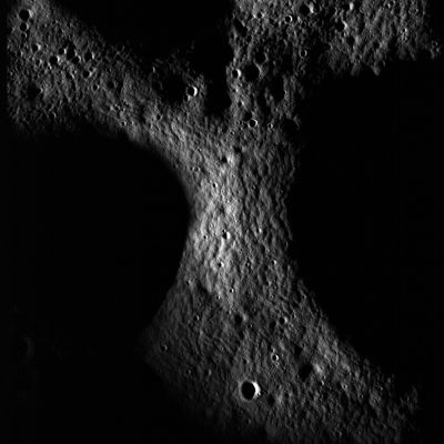 Peary Crater and the North Pole of the Moon
One day in the not-too-distant future, lunar explorers may spend their winter holidays at the Lunar North Pole. 

Peary, an irregularly-shaped Impact Crater centered at 88,5° North Lat. and approx. 30° East Long., could be the place to do just that. 
Adjacent to the Lunar North Pole, Peary has areas along its Crater Floor cast in permanent shadow, but it also has areas along its rim that may be permanently illuminated by the Sun. The proximity to the North Pole, possible areas of permanent shadow and light, plus the potential for in-situ resources make Peary crater a challenging and enticing location for future human and robotic exploration. 

Peary Crater is one of 50 specific sites being explored by lunar geologists using LROC images for NASA's Constellation Program.
Parole chiave: The Moon from orbit - Craters - Peary Crater