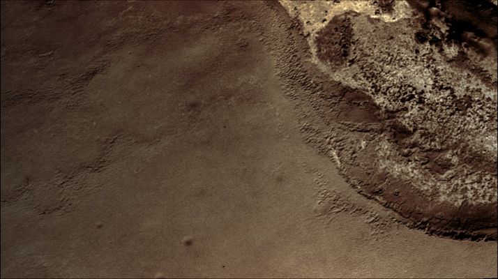 Outcrop and Surface of Meridiani Planum (Absolute Natural Colors; credits for the additional process. and color: Dr Paolo C. Fienga - Lunexit Team)
Image information: VIS instrument;
Latitude: 0,9° North;
Longitude: 0,6° East;
Resolution: 18 meter/pixel 
Parole chiave: Mars from orbit - Meridiani Planum