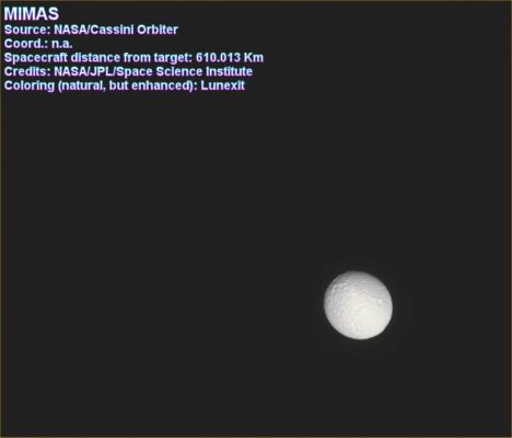 Mimas: the "Egg-like Moon"
Mimas ID:"Mimas is made primarily of water-ice. Its surface is heavily cratered, indicating that its impact features may date back to the time of the moon's creation.
One of the craters, named Herschel, is surprisingly large - nearly one-third the moon's entire diameter. Herschel is 10 Km (about 6 miles) deep, with a central mountain that rises 6 Km (about 3,7 miles) above the crater floor. 
Traces of fracture marks can be seen on the opposite side of Mimas.

Mimas was discovered in 1789 by William Herschel; its mean distance from Saturn is approximately equal to 185.520 Km (such as about 115.277 miles); its mass is: 3.81 x 1019 Kg (such as 8.3 x 1019 lbs) and its dimensions are: 418 x 392 x 383 Km (260 x 244 x 238 miles)".
Period of Orbit around Saturn: 22.6 hours
Parole chiave: Saturn's Moons - Mimas