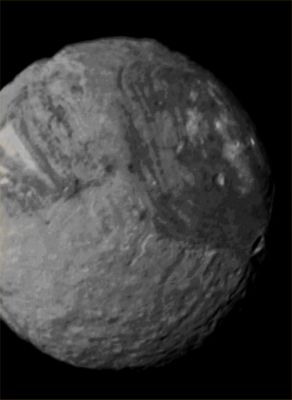 Miranda's Southern Hemisphere (Possible Absolute Natural Colors; credits for the additional process. and color.: Dr Paolo C. Fienga/Lunar Explorer Italia/Italian Planetary Foundation)
This image-mosaic of the Uranian moon Miranda was taken by the NASA - Voyager 2 Spacecraft on January 24, 1986, from a distance of approx. 147.000 Km (such as about 91.287 miles). This image-mosaic was constructed from images taken through the Spacecraft's Narrow-Angle Camera's Green, Violet and UltraViolet Filters. 
Miranda, just about 480 Km (such as approx. 299 miles) across, is the smallest of Uranus' five Major natural satellites. Miranda's Regional Geologic Provinces are shown very well in this view of its Southern Hemisphere, imaged at a resolution of roughly 2,7 Km (such as 1,67 miles) per pixel. The dark- and bright-Banded Region with its curvilinear traces, covers about half of the frame. Higher-resolution pictures taken some time later showed many Fault Valleys and Ridges, all parallel to these "Bands". Near the Terminator Line (on the right - Dx), another system of Ridges and Valleys abuts the Banded Terrain; furthermore, many Impact Craters pockmark the Surface of Miranda all over this Region. The largest of these Craters are about 30 Km (approx. 18,63 miles) in diameter and many more of them lie in the range of 5 to 10 Km (such as from 3,1 to 6,2 miles) in diameter. 

This frame (which is an Original NASA - Voyager 2 Spacecraft Natural Color image-mosaic published on the NASA - Planetary Photojournal with the ID n. PIA 00042) has been additionally processed, contrast enhanced, magnified to aid visibility of the Surface details and then re-colorized, according to an educated guess carried out by Dr Paolo C. Fienga/LXTT/IPF, in what they should be its Absolute Natural Colors (such as the colors that a human eye would actually perceive if someone were onboard the NASA - Voyager 2 Spacecraft and then looked outside, towards the Uranian moon Miranda), by using an original technique created - and, in time, dramatically improved - by the Lunar Explorer Italia Team. Different colors, as well as different shades of the same color, mean, among others, the existence of different Elements present on the Surface of Miranda, each having a different Albedo (---> Reflectivity) and Chemical Composition.

Note: it is possible (but we, as IPF, have no way to be one-hundred-percent sure of such a circumstance), that the actual luminosity of Miranda - as it is in this frame - would appear, to an average human eye, a little bit lower than it has been shown (or, better yet: interpreted) here.
Parole chiave: Uranian Moons - Miranda