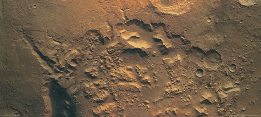 Nepenthes Mensae (MULTISPECTRUM; credits: Lunexit)
The High Resolution Stereo Camera on board ESA’s Mars Express Orbiter imaged Nepenthes Mensae, a river delta on Mars, on 22 January 2008. 
The data was acquired in the Region lying at approx. 3° North and 121° East, with a ground resolution of 15 mt/pixel. 
The southern part of the image shows a structure reminiscent of a river delta on Earth, whose material was eroded from a valley, about 30 Km long and upto 1000 mt deep. This formed a fan-shaped deposit at the mouth of the valley. The rim of the deposit stands roughly 300 mt above the floor of the depression. 
The resemblance of the structure to river deltas on Earth suggests that it was formed by a similar mechanism. Scientists believe that sediment transported by water was deposited as the flow of the water slowed down where the channel widened and met the mouth of the river. 

The pictures show that the Region was affected by two episodes of flooding. 
The first left a cone-shaped deposit, reaching far out into the lowland. 
The second episode formed the fan with the distinct margin. This margin could indicate the location where sediments flowed into a standing body of water or ice. 

Numerous hills and flat-topped mountains visible in the central part of the depression are remnants of the material that was present in the area. 
The material was then eroded forming the depression, leaving behind the elevations visible today.
Parole chiave: Mars from orbit - Nepenthes Mensae