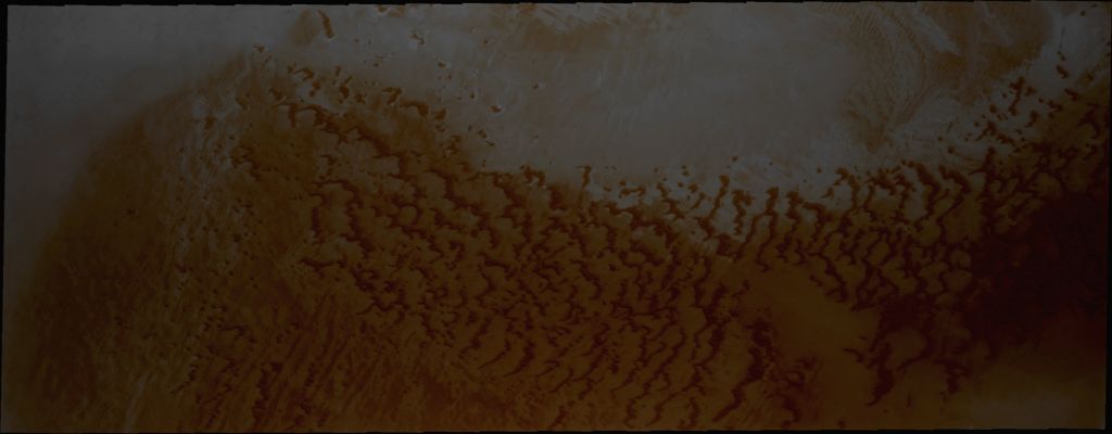 North Polar Dunefields (Natural Colors; credits for the additional process. and color.: Dr Paolo C. Fienga - Lunexit Team)
Caption NASA:"In this image we can see Dunes near the North Pole of Mars. It appears that small individual Dunes are coalescing into larger dune forms (Dunefields)".

Orbit Number: 37623 
Latitude: 78,6159° North 
Longitude: 118,498° East 
Instrument: VIS 
Captured: 2010-06-08 at 05:01 MLT (early morning)
Parole chiave: Mars from orbit - North Polar Features - Erg