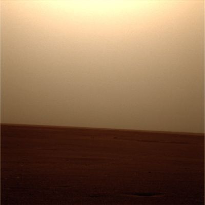 Dark Skies over Opportunity (2) - Sol 1225
Pictures from the orbiter's Mars Color Imager show the storm is regional in extent, and includes several local areas of especially high dust activity. The storm has been moving Eastward and toward Mid-Latitudes, and is now also causing an increase in atmospheric dust at Spirit's location, on the opposite side of the Planet, at Gusev Crater. 
Dust levels at Gusev remain much lower than at the Opportunity site, however. 

Both rovers take daily measurements estimating the amount of dust in the atmosphere. The less dust the better, because it means more sunlight reaches the rover's solar panels, which power the vehicles. In the last week, Opportunity has broken its dust record, with the opacity level rising from 1.0 to 3.3. Solar array energy on Opportunity dropped from 765 watt-hours to 402 watt-hours over the same period of time.
Parole chiave: Martian Horizon - Meridiani Planum