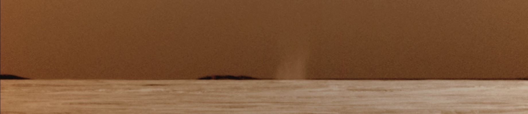 First Dust Devil seen by Opportunity - Sol 2301 (False Colors; credits for the additional process. and color.: Dr Paolo C. Fienga - Lunexit Team)
Caption NASA:"This is the first Dust Devil that NASA's Mars Exploration Rover Opportunity has observed in the Rover's sixth and a half year of staying on Mars. 
The whirlwind appeared in a routine drive-direction image taken by Opportunity's PanCam right after a drive during the 2301st Martian Day, or Sol, of the Rover's mission on Mars (such as July 15, 2010).

Contrast has been stretched and the image has been carefully calibrated to make the Dust Devil easier to see against the Martian Sky. 

Opportunity's twin, Spirit, has observed dozens of Dust Devils at its location in Gusev Crater - halfway around Mars from Opportunity's location in the Meridian Planum Region. Opportunity conducted systematic searches for Dust Devils in past years without seeing any. A rougher and dustier Surface at Gusev makes Dust Devils form more readily there than at Meridiani".
Parole chiave: Martian Horizon - Meridiani Planum - Dust Devil