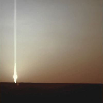 Setting Sun over Meridiani Planum - Sol 2411 (Natural Colors; credits for the additional process. and color.: Dr Paolo C. Fienga - Lunexit Team)
Questo processing in Colori Naturali del Tramonto Marziano occorso al termine del Sol 2411 del MER Opportunity è stato ottenuto utilizzando i consueti criteri propri della "Colorizzazione Naturale" (NON Assoluta), ed ipotizzando una TAU medio/bassa.
La differenza più eclatante fra questo processo di colorizzazione ed i relativi risultati, rispetto al processo di colorizzazione (e relativi risultati) adottato dalla NASA è nella estrema chiarezza e luminosità del panorama Marziano; una chiarezza e luminosità che nei frames processati in "approximate true/natural colors" dalla NASA appare invece inesistente (il Cielo Marziano del tramonto, according to NASA, è quasi sempre di color rosa scuro ed uniforme, oppure di un azzurro scurissimo - diremmo "azzurro tenebra"...).

Strano. 
Strano, soprattutto perchè è proprio la NASA ad aver detto e scritto, molte volte, che il Cielo Marziano del tramonto è "extremely bright" e che la sua "brightness" resiste anche sino a 2 (o più) ore dopo il calar del Sole (a causa, inter alia e soprattutto, delle polveri sottilissime in sospensione che si trovano negli strati medio alti ed alti dell'Atmosfera del Pianeta Rosso, le quali continuano a riflettere e diffondere la Luce del Sole - ancora (relativamente) intensa, evidentemente, dal loro angolo visuale).
Parole chiave: Martian Sunset