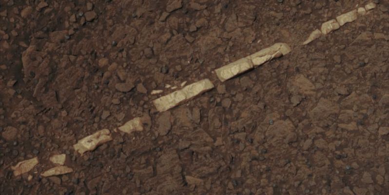 Homestake Vein - Sol 2769 (Absolute Natural Colors; credits for the additional process. and color.: Dr Paolo C. Fienga - Lunar Explorer Italia)
Caption NASA:"This Absolute Natural Color view of a Mineral Vein called "Homestake" comes from the Panoramic Camera (PanCam) on NASA's Mars Exploration Rover Opportunity. The Vein is about the width of a thumb and about 18" (45 centimeters) long. Opportunity examined it in November 2011 and found it to be rich in Calcium and Sulfur, possibly the Calcium-Sulfate mineral Gypsum.
"Homestake" is near the edge of the "Cape York" segment of the Western Rim of Endeavour Crater".

Parole chiave: Martian Surface - Mineral Vein - Homestake