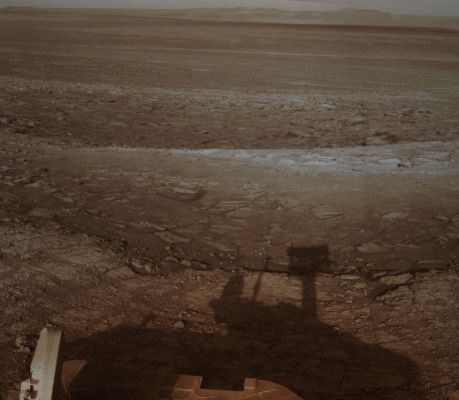 Low Sun over Endeavour Crater (Absolute Natural Colors; credits for the additional process. and color.: Dr Paolo C. Fienga/Lunar Explorer Italia/Italian Planetary Foundation)
The NASA - Mars Exploration Rover (MER) Opportunity used its Navigation Camera (NavCam) to record this vista looking Eastward across Endeavour Crater, with the Rover's own shadow in the foreground. The NASA - Mars Exploration Rover (MER) Opportunity has been studying the Western Rim of Endeavour Crater since arriving there, in August 2011. Endeavour Crater, which spans approx. 14 miles (such as about 22,53 Km) in diameter, is, by far, the largest Impact Crater that Opportunity has visited since it landed on Mars, Region of Meridiani Planum, in January 2004. The images that have been used to create this mosaic were taken during the 3020th Martian Day, or Sol, of Opportunity's work on the Red Planet (such as July 22, 2012, on Earth)

This frame (which is an Original NASA - Mars Exploration Rover "Opportunity" Original b/w image-mosaic published on the NASA - Planetary Photojournal and identified by the ID n. PIA 16923) has been additionally processed and then colorized in Absolute Natural Colors (such as the colors that a normal - meaning "in the average" - human eye would actually perceive if someone were on the Surface of Mars, near the NASA - Mars Exploration Rover (MER) Opportunity, and then looked ahead, towards the Horizon and Sky over Endeavour Crater), by using an original technique created - and, in time, dramatically improved - by the Lunar Explorer Italia Team.
Parole chiave: Martian Surface - Craters - Endeavour Crater - Eastern Rim