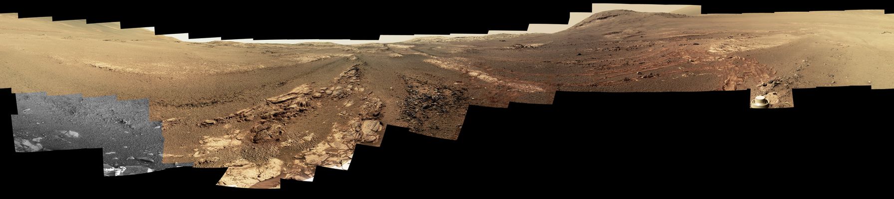 Panorama - Sol 5084 (Image-Mosaic - Approximate True Colors)
Caption NASA:"This 360° panorama is composed of 354 images taken by the MER Opportunity's Panoramic Camera (or "PanCam", for short) from May 13 through June 10, 2018, or Soles (i.e.: Martian Days) 5084 to and through 5111. 

This is the last panorama Opportunity acquired before the solar-powered MER succumbed to a Global Martian Dust Storm on the same abovementioned Sol. This version of the scene is presented in Approximate True Colors.

To the right (Dx) of center and near the top of the frame, the Rim of Endeavour Crater rises in the distance. Just to the left (Sx) of that, Rover Tracks begin their descent from over the horizon towards the location that would become Opportunity's final resting spot in Perseverance Valley, where the panorama was taken. 

At the bottom, just left of center, is the Rocky Outcrop Opportunity was investigating with the instruments on its Robotic Arm (or RA, for short). To the right of center and halfway down the frame is another Rocky Outcrop — about 23 feet (such as abou 7 meters) distant from the camera — called "Ysleta del Sur," which Opportunity investigated from March 3 through 29, 2018, or Soles 5015 through 5038. In the far right and left of the frame are the bottom of Perseverance Valley and the Floor of Endeavour Crater.

Located on the inner Slopes of the Western Rim of Endeavour Crater, Perseverance Valley is a system of shallow Troughs descending eastward about the length of two football fields from the crest of Endeavour's Rim to its Floor.

This (note: they wrote Approximate) True-Color version combines images collected through three PanCam filters. The filters admit light centered on wavelengths of 753 nanometers (near-infrared), 535 nanometers (green) and 432 nanometers (blue). The three-color bands are combined.

A few frames (bottom left) remain black and white, as the solar-powered rover did not have the time to photograph those locations using the green and violet filters before a severe Mars-wide Dust Storm swept in on June 2018".
Parole chiave: Martian Panorama