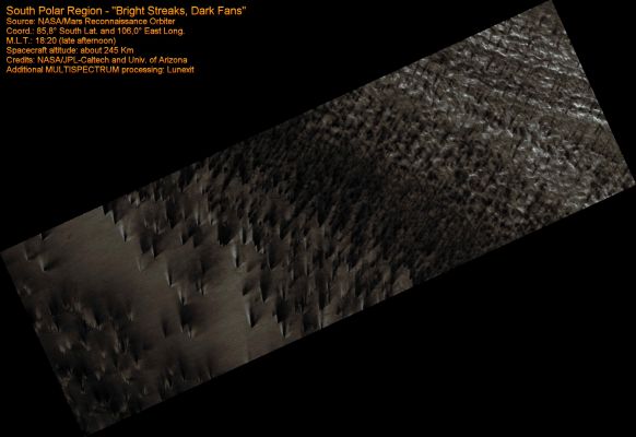 Bright Streaks and Dark Fans (MULTISPECTRUM; credits: Lunexit)
The South Polar Region of Mars is covered every year by a layer of Carbon Dioxide (CO2) ice. In a Region called the "cryptic terrain", the ice is translucent and sunlight can penetrate through the ice to warm the surface below. 

The ice layer sublimates (evaporates) from the bottom. The Dark Fans of dust seen in this image come from the surface below the layer of ice, carried to the top by gas venting from below. The translucent ice is "visible" by virtue of the effect it has on the tone of the surface below, which would otherwise have the same color and reflectivity as the Fans. 

Bright streaks in this image are fresh frost. The CRISM team has identified the composition of these streaks to be Carbon Dioxide. 

Nota Lunexit: questa è la surface feature che ha "stimolato" l'immaginazione di Joseph Skipper e Richard Hoagland. Secondo costoro, le "dark features" sarebbero alberi simili ai "pioppi" terrestri... Ogni ulteriore commento ci sembra davvero inutile.
Parole chiave: Mars from orbit - South Polar Region