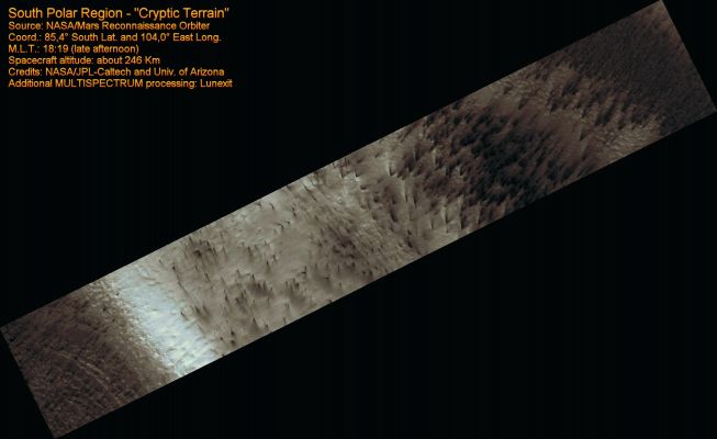 Cryptic Terrain (MULTISPECTRUM; credits: Lunexit)
There is an enigmatic Region near the South Pole of Mars known as the "cryptic" terrain. It stays cold in the Spring, even as its albedo darkens and the Sun rises in the sky. 

This Region is covered by a layer of translucent seasonal CO2 ice that warms and evaporates from below. As CO2 gas escapes from below the slab of seasonal ice it scours dust from the surface. The gas vents to the surface, where the dust is carried downwind by the prevailing wind. 

The channels carved by the escaping gas are often radially organized and are known informally as "spiders". 
Parole chiave: Mars from orbit - South Polar Region - Spiders