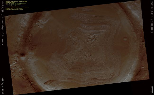 Unnamed Craters with Layered Deposits in Utopia Planitia (Natural Colors; credits: Lunexit)
This image shows an Unnamed Impact Crater located in Utopia Planitia (Northern Hemisphere of Mars) that is filled with layered material. 

The layered character of these Deposits is consistent with episodic deposition. Each distinct layer represents a period of sediment deposition. The layers are parallel to each other, indicating that deposition occurred by material settling onto the Surface, rather than being blown across the Surface in Sand Dunes.

The hummocky texture of these deposits suggests that volatiles (such as Carbon Dioxide Ice) are mixed in with the rocky sediment.
Parole chiave: Mars from orbit - Craters - Unnamed Crater in Utopia Planitia