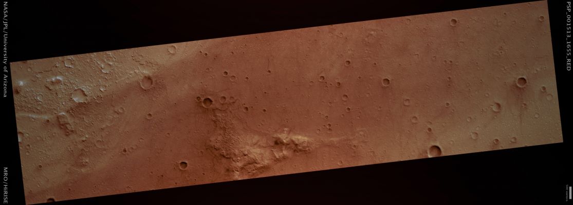 The MER Spirit Landing Site (ctx frame - Natural Colors; credits: Lunar Explorer Italia)
This HiRISE image shows the Landing Site of the Mars Exploration Rover Spirit. The impact crater in the upper left-hand portion of the image is "Bonneville Crater", which was investigated by Spirit shortly after landing. In the lower right-hand portion of the image is "Husband Hill", a large hill that Spirit climbed and where it spent much of its now nearly five-year mission.

M.L.T.: 15:29 (early afternoon)
Latitude (centered): 14,6° South and Longitude 175,5° East
Range to target site: 270,7 Km (approx. 169,2 miles) 
Original image scale range: 27,1 cm/pixel (with 1 x 1 binning) so objects ~81 cm across are resolved 
Map projected scale: 25 cm/pixel and North is up 
Map projection: EQUIRECTANGULAR
Emission angle: 15,8° 
Phase angle: 73,6° 
Solar Incidence Angle: 60°, with the Sun about 30° above the Local Horizon 
Solar Longitude: 139,1° (Northern Summer)
Parole chiave: Mars from orbit - Landing Sites - MER Spirit