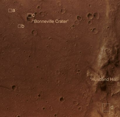 The MER Spirit Landing Site (edm - Natural Colors; credits: Lunar Explorer Italia)
The bright irregularly-shaped feature in area "A" of the image is Spirit's parachute, now lying on the Martian surface. Near the parachute is the cone-shaped "backshell" that helped protect Spirit's lander during its seven-month journey to Mars. The backshell appears relatively undamaged by its impact with the martian surface. Wrinkles and folds in the parachute fabric are clearly visible. 

Area "B" of the image shows Spirit's lander. The crater in the upper left-hand portion of the image, just to the northwest of the lander, is the one that the Mars Exploration Rover team named "Sleepy Hollow".

Area "C" shows the damaged remnant of the heat shield that protected the vehicle during the high-speed entry through the Martian atmosphere. The heat shield impacted the surface after being separated from the vehicle during the final stages of the descent. 

Area "D" of the image shows the current location of Spirit. Toward the top of the image is "Home Plate", a plateau of layered rocks that Spirit explored during the early part of its third year on Mars. Spirit itself is clearly seen just to the southeast of Home Plate. Also visible are the tracks made by the rover before it arrived at its current location.
Parole chiave: Mars from orbit - Landing Sites - MER Spirit