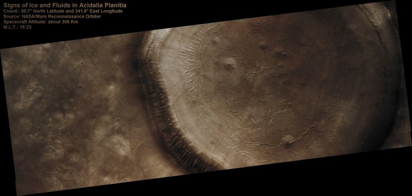 Signs of Fluids and Ice in an Unnamed Crater in Acidalia Planitia (CTX Frame - Absolute Natural Colors; credits for the additional process. and color.: Dr Paolo C. Fienga - Lunexit Team) 
This image shows an Unnamed Crater approx. 11 Km (about 7 miles) in diameter, located in Acidalia Planitia, part of the Northern Plains. Several features in and around this Crater are suggestive of fluids and ice at and near the surface. 
The muted topography of the Crater and its surroundings, the relatively shallow floor (300 mt or 330 yards), the convex slope of its Walls — all are consistent with ice being present under the Surface, mixed with rocks and soil. Ice would have acted as a lubricant, facilitating the flow of rocks and soils and hence smoothing landscape's features such as ridges and Craters' Rims.

The concentric and radial fissures in the Crater's Floor may indicate decrease of volume due to loss of underground ice. Piles of rocks aligned along these fissures and arranged forming polygons are similar to features observed in terrestrial periglacial regions such as Antarctica. 
Antarctica's features are produced by repeated expansion and contraction of subsurface soil and ice, due to seasonal temperature oscillations. 

The funnel-shaped depressions visible in the Crater's Floor could be Collapse Pits, further evidence of ice decay; alternatively, they could be smoothed-out small Impact Craters.  
 

Parole chiave: Mars from orbit - Craters - Unnamed Crater - Acidalia Planitia