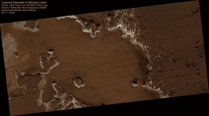 Layered Deposits in Ritchey Crater (Enhanced Natural Colors; credits for the additional process. and color.: Dr Paolo C. Fienga - Lunexit Team)
This HiRISE image shows eroding layered deposits in Ritchey Crater, a large impact crater in the Southern Highlands. 
Three general units can be seen: a relatively dark upper layer, a light middle unit, and the floor material, which may be mostly obscured by dust. 
The dark cap layer appears to be relatively hard and resistant, while the light material is weak. 
Once the upper layer is removed, the light layer does not last long. 

It is unclear how each of these layers formed. 
Volcanic ash layers, lake or stream deposits, or sandstone deposited by dunes can all produce horizontal layers. Unraveling the origin would provide important clues to Mars' past.
Parole chiave: Mars from orbit - Craters - Ritchey Crater