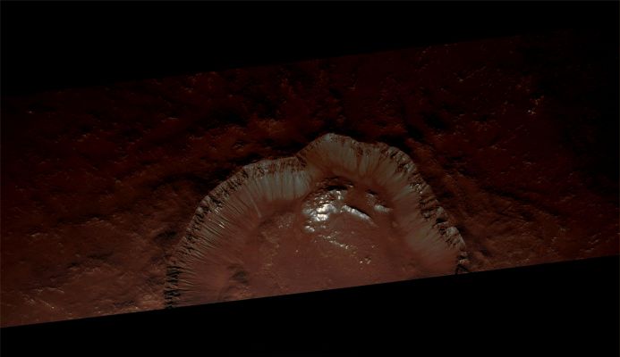 Bright Gully Deposit in Terra Sirenum (ctx image - MULTISPECTRUM; credits: Lunar Explorer Italia)
This HiRISE image shows a bright gully deposit and other gullies within a crater wall in Terra Sirenum (37,7° South Lat. and 229,0° East Long.). 

Three images are available: 

(context image - A): The full frame HiRISE image, with the crater at left center; the width of the image is 6 Km; 
(close-up of the crater's rim - B): an enlargement showing the crater; 
(close-up of the bright gully deposit - C). 

Frames B and C have been stretched to enhance contrast. The red box in B shows the location of C. 
Parole chiave: Mars from orbit - Craters - Unnamed Crater in Terra Sirenum