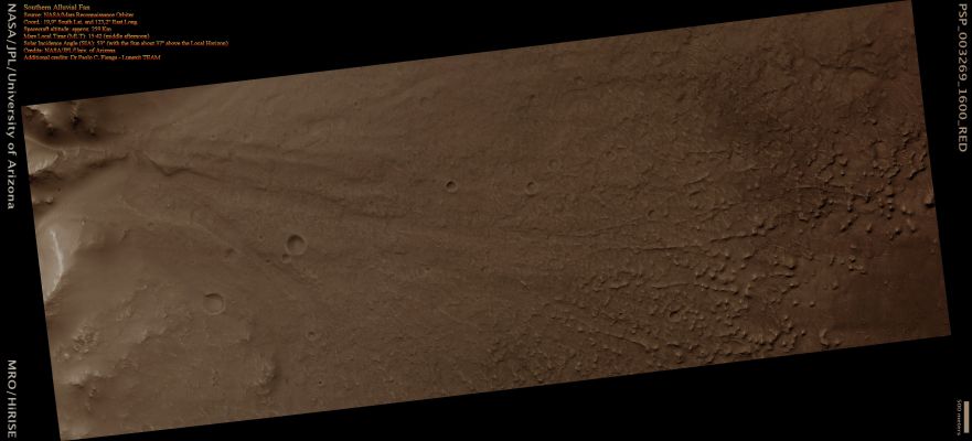 Southern Alluvial Fan (Natural Colors; credits for the additional process. and color.: Dr Paolo C. Fienga - Lunexit Team)
HiRISE image PSP_003269_1600 covers an Alluvial Fan along the wall of a large Unnamed Crater in the Mid Latitudes of the Southern Hemisphere of Mars. 
The Fan was formed when water and sediments drained down the steep wall of the Crater creating a cone-shaped pile of debris at the base. 
As the Fan grew with time, the Channels carrying water and sediment across its Surface changed locations, thus producing a Layered Deposit capped by Channels radiating from the Fan apex along the Crater Wall.
Subsequent stripping of the Fan Surface by the wind has left the coarser Channel Deposits in relief and exposed the fine scale layering within the Fan in many locations. 

While is it is not known whether the source of the water responsible for creating the Fan was related runoff from precipitation or groundwater or perhaps both, Alluvial Fans of broadly similar form are observed in many locations on Earth and are usually formed by runoff from precipitation. 
Parole chiave: Mars from orbit - Alluvial Fan