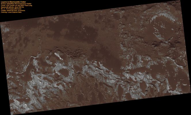 Layers in Eberswalde Crater
This image covers a portion of Eberswalde Crater, revealing a possible delta-lake transition. Water flowed into the crater through a series of tributary channels to the west of the crater and after the water entered, it formed a distributive network and partly filled the crater to form a lake (Eberswalde Crater is approx. 70 Km wide and 1,2 Km deep). 

The bright layers are part of the terminal scarp at the eastern edge of the delta. Some of the steeper slopes visible at the edge of the fan may be coarser-grained resistant channel ridges. The CRISM instrument on board the Mars Reconnaissance Orbiter has detected phyllosilicates (clays) in the bright layers. One of the ways clays form on Earth is when water erodes rock and makes fine particles which settle out of water; this often occurs in river deltas and lake beds. 
The delta in Eberswalde Crater and the detection of phyllosilicates provides evidence for possible persistent aqueous activity on Mars.
Parole chiave: Mars from orbit - Craters - Eberswalde Crater