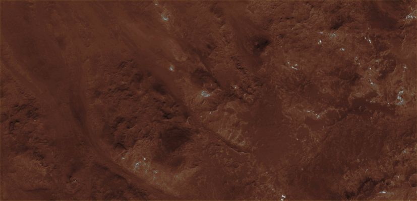 Features of Holden Crater's Rim (CTX Frame "B" - Absolute Natural Colors; credits for the additional process. and color.: Dr Paolo C. Fienga - Lunexit Team)
HiRISE image PSP_004277_1530 covers a portion of the rim of Holden Crater, revealing breaches created when water over-topped the Rim and incised a series of Channels as it flowed down the Crater Wall. 
The water responsible for the Channels was impounded outside of the rim of Holden in Uzboi Vallis (Holden Crater itself is approx. 150 Km in diameter).

Uzboi Vallis was interrupted when Holden Crater formed and the Rim formed an effective, temporary damn to flow farther to the North. Once the Uzboi Basin filled, water began flowing into Holden again, creating a series of low fan-shaped Deltas, alluvial deposits and a shallow, but relatively short-lived lake. 

The Channels in this image were only active for a short time, as a Channel just to the East cut quickly into the Rim and became responsible for most of the drainage into the Crater. 
The fact that most of the fan-shaped Deltas radiate from the Dominant Channel to the East rather than those in this image supports this scenario. 
Parole chiave: Mars from orbit - Craters - Holden Crater
